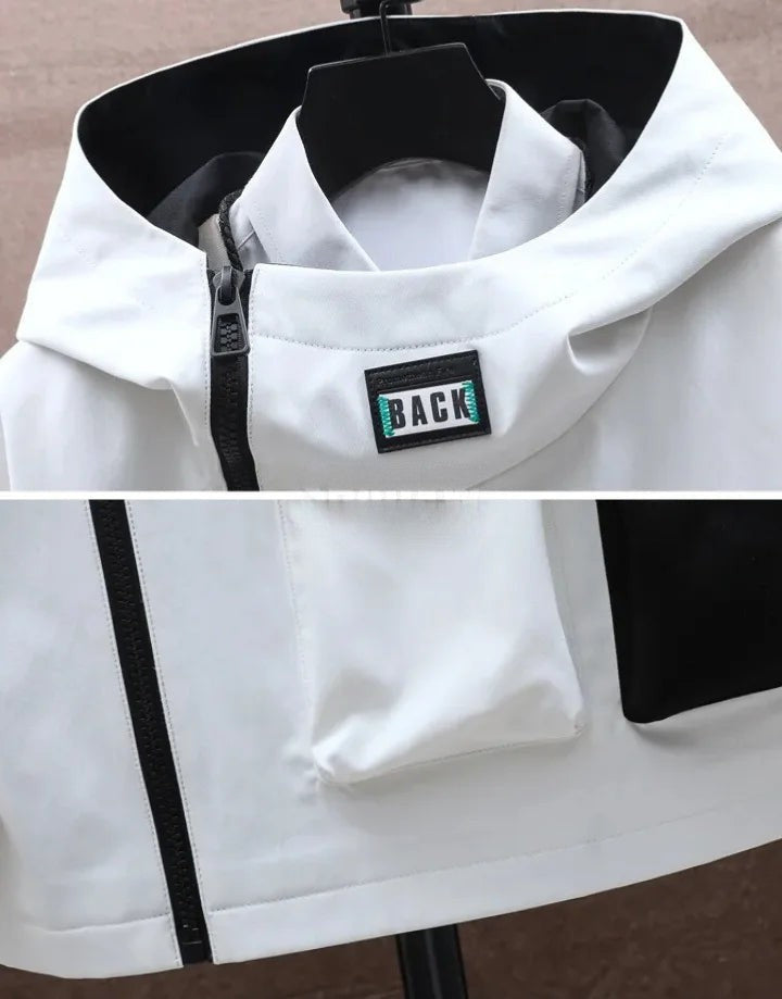 White jacket with a 'BACK' label on a mannequin against a neutral background