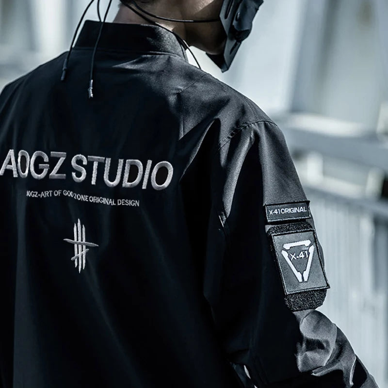shop and buy Black bomber jacket with pockets and a belt on a gray background