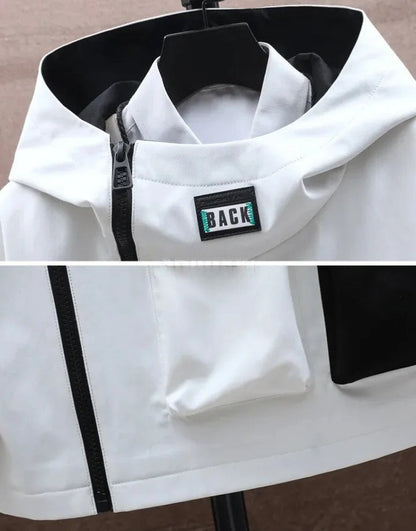 White jacket with a 'BACK' label on a mannequin against a neutral background